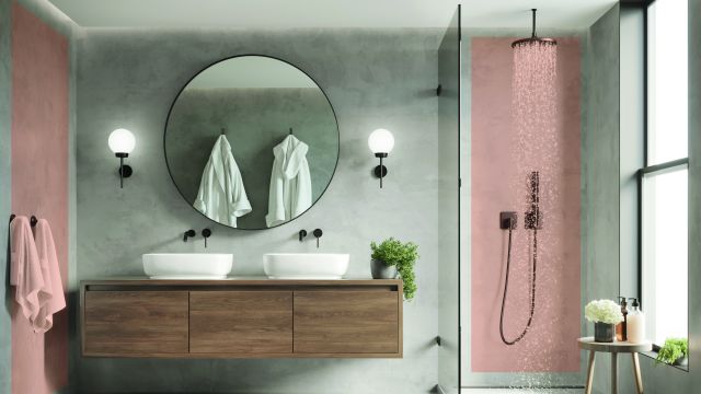 badkamer Een badkamer met wastafel, ligbad en douche.