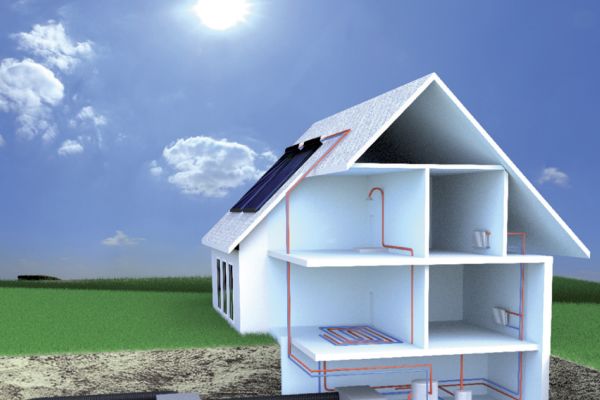 Die Grafik zeigt ein Haus mit erdgekoppelter Wärmepumpe und ihren Mediumrohren im Erdreich. 