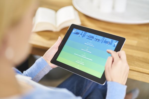 App zur Haussteuerung des Smart Home-Systems von innogy auf einem Tablet.